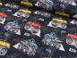 Preview: Baumwolljersey mit Monstertrucks auf Schwarz